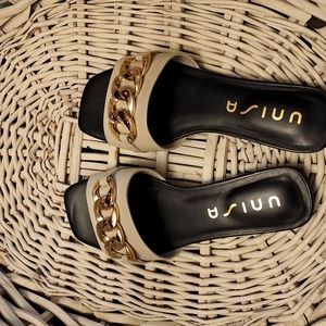 Unisa slides. Size 7.5M. Cream/ off white with gold embellishment..